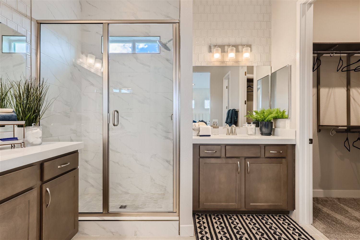 A bathroom with a glass shower.