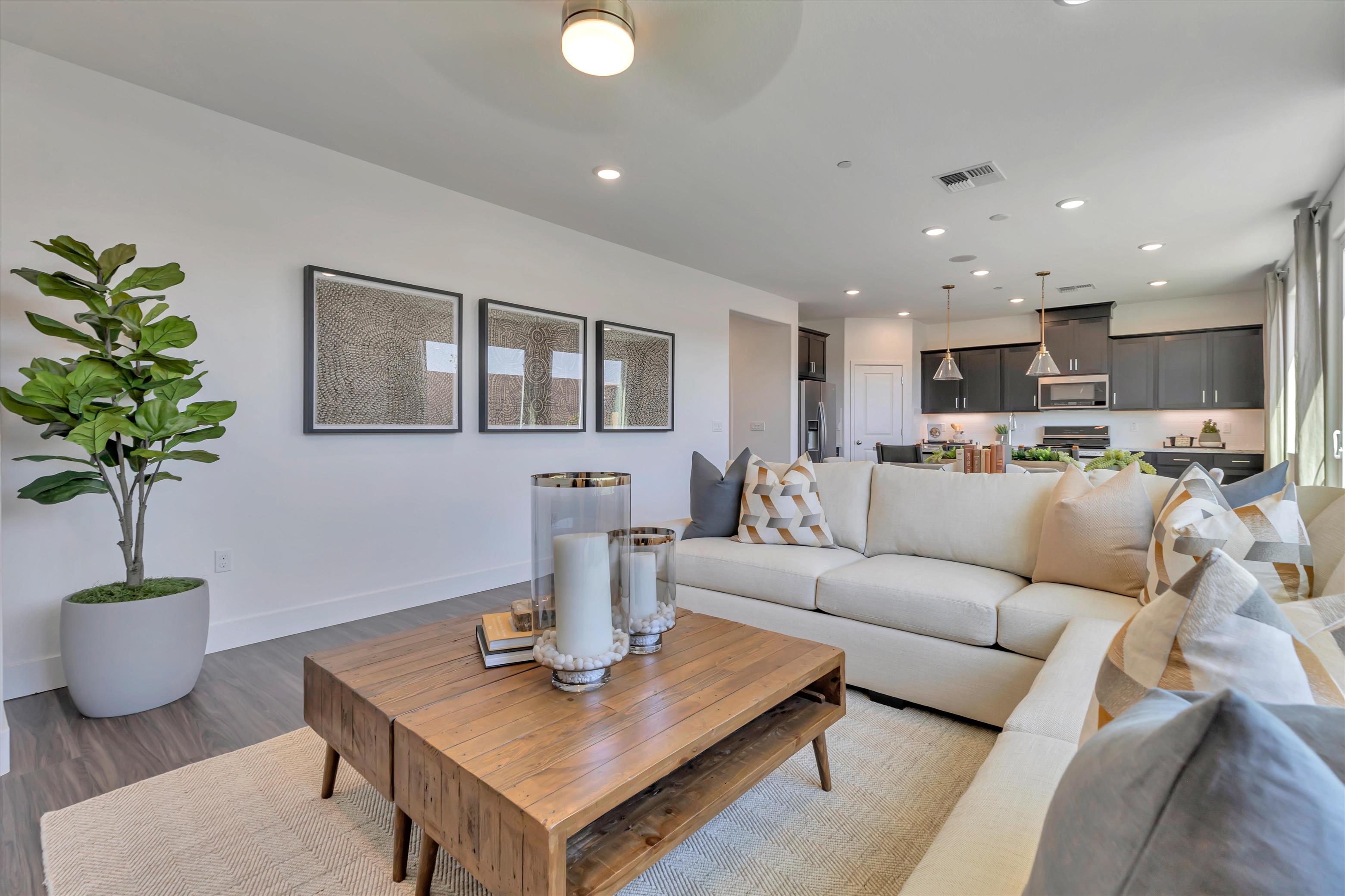 A living room with a couch and a coffee table.