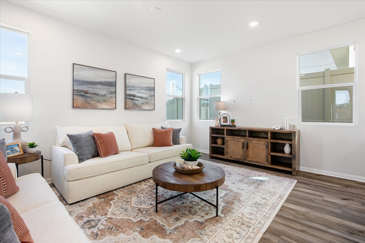 A living room with a couch and a coffee table.