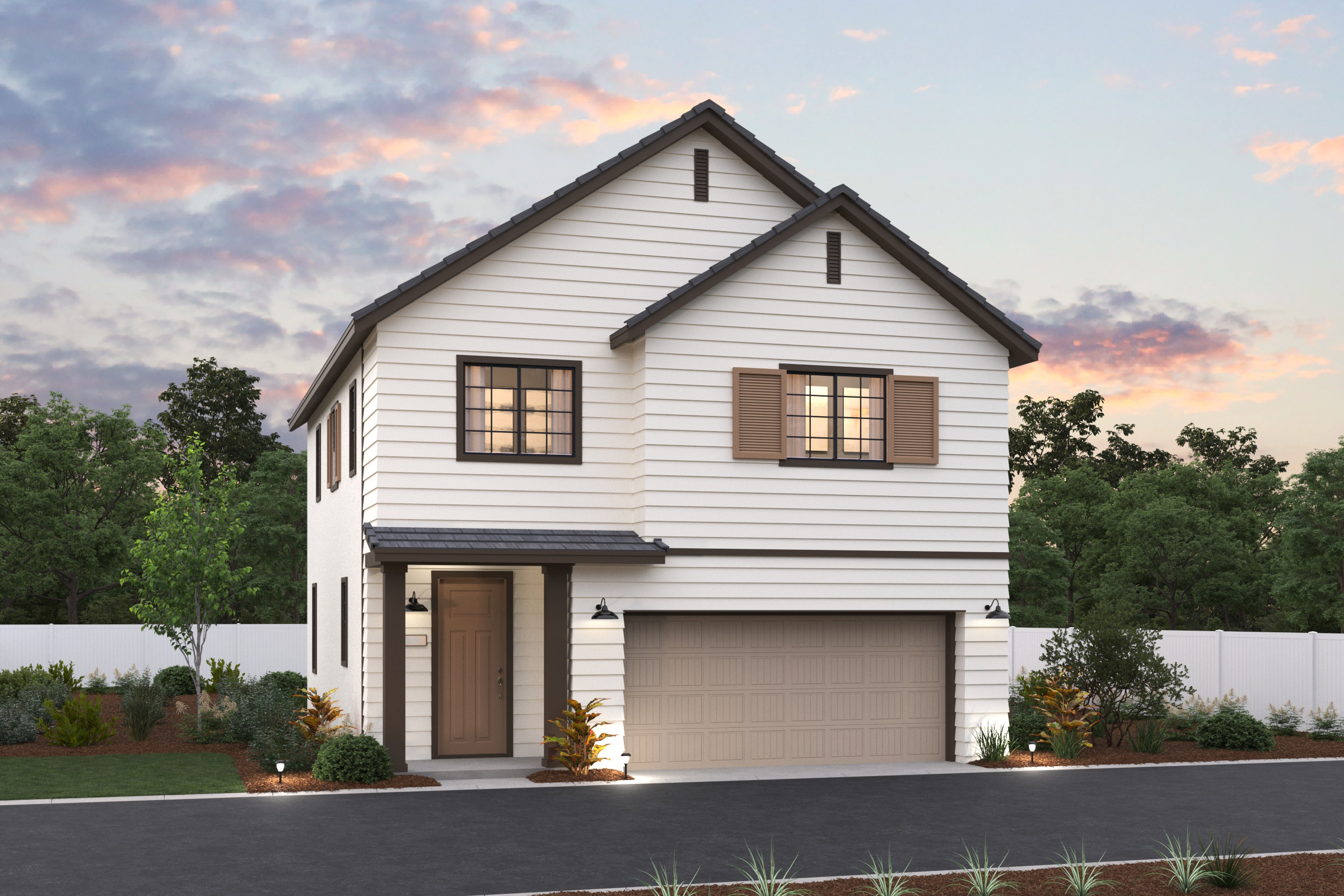 A white house with a garage.