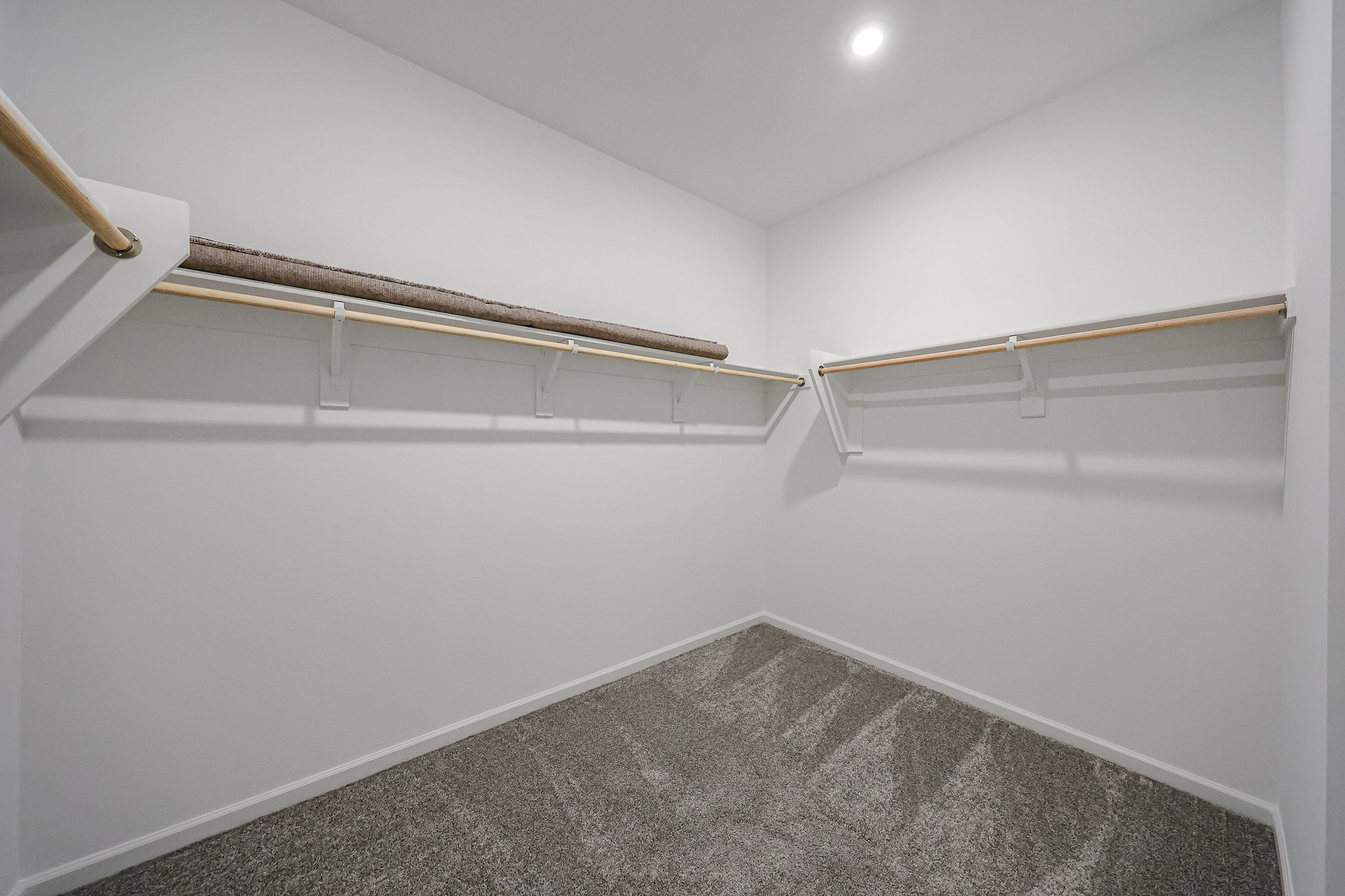 A white wall with a staircase.