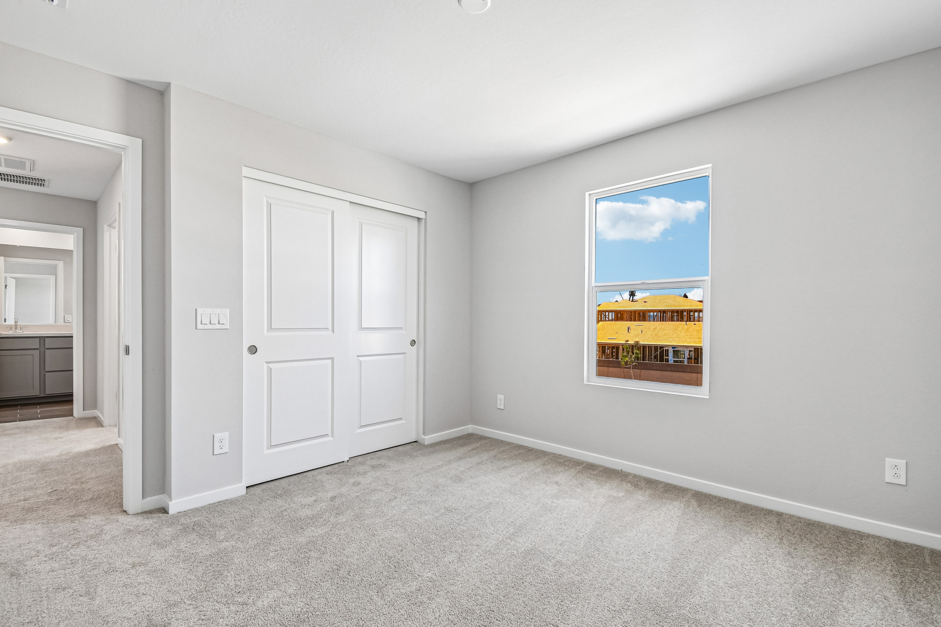 A room with white doors.