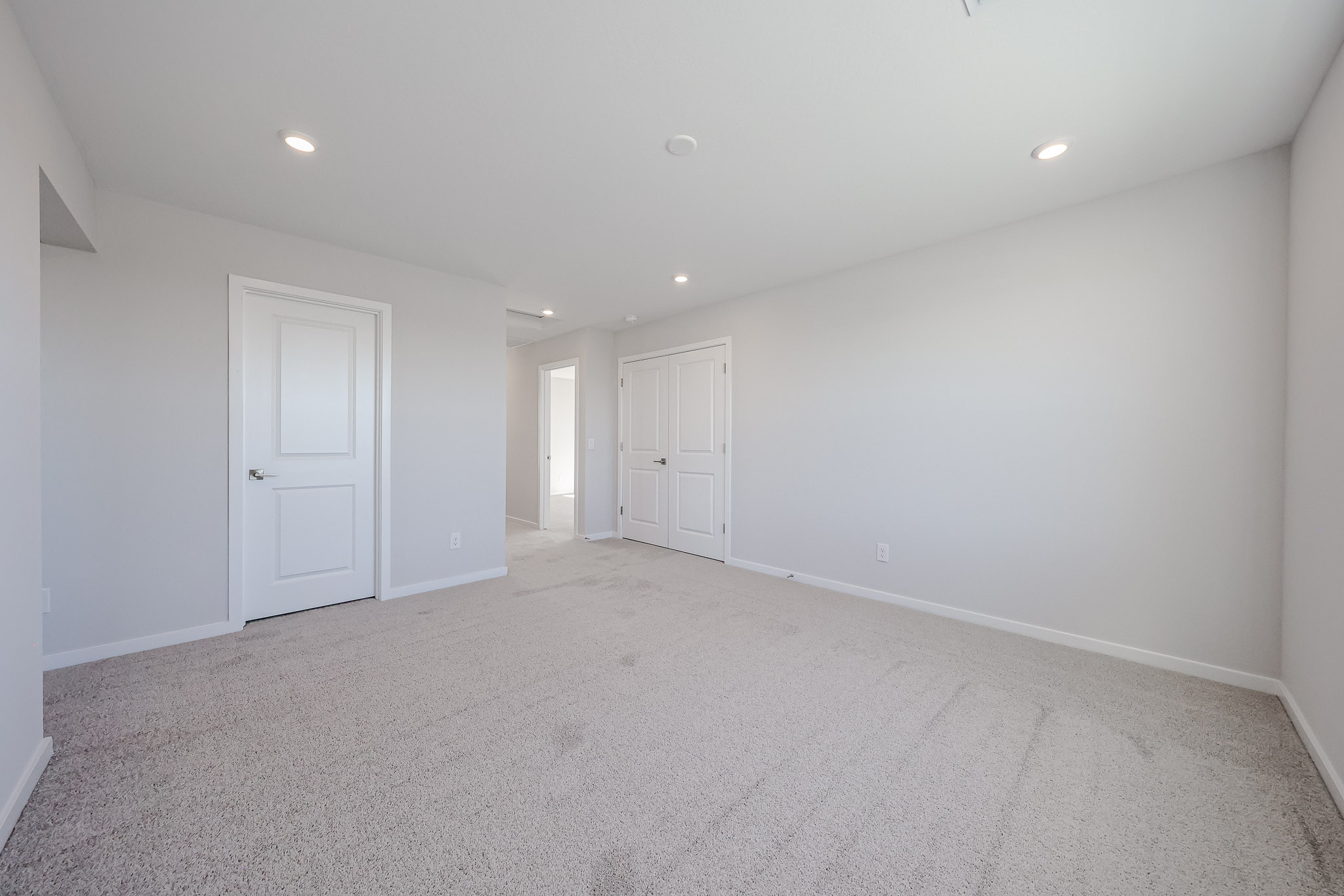 A room with white doors.