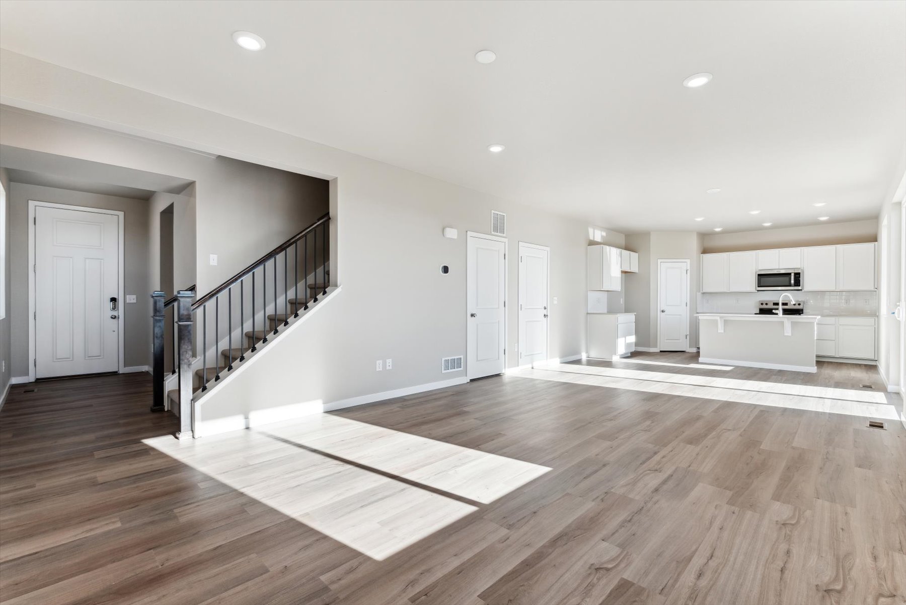 A large empty room with white walls.