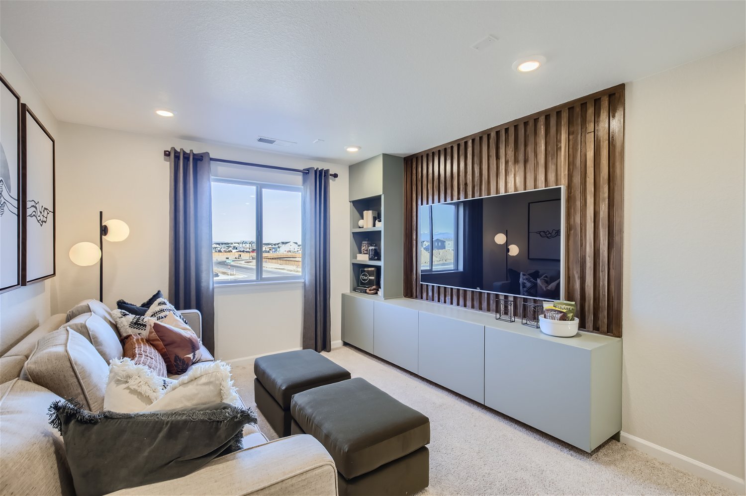 A living room with a large window.