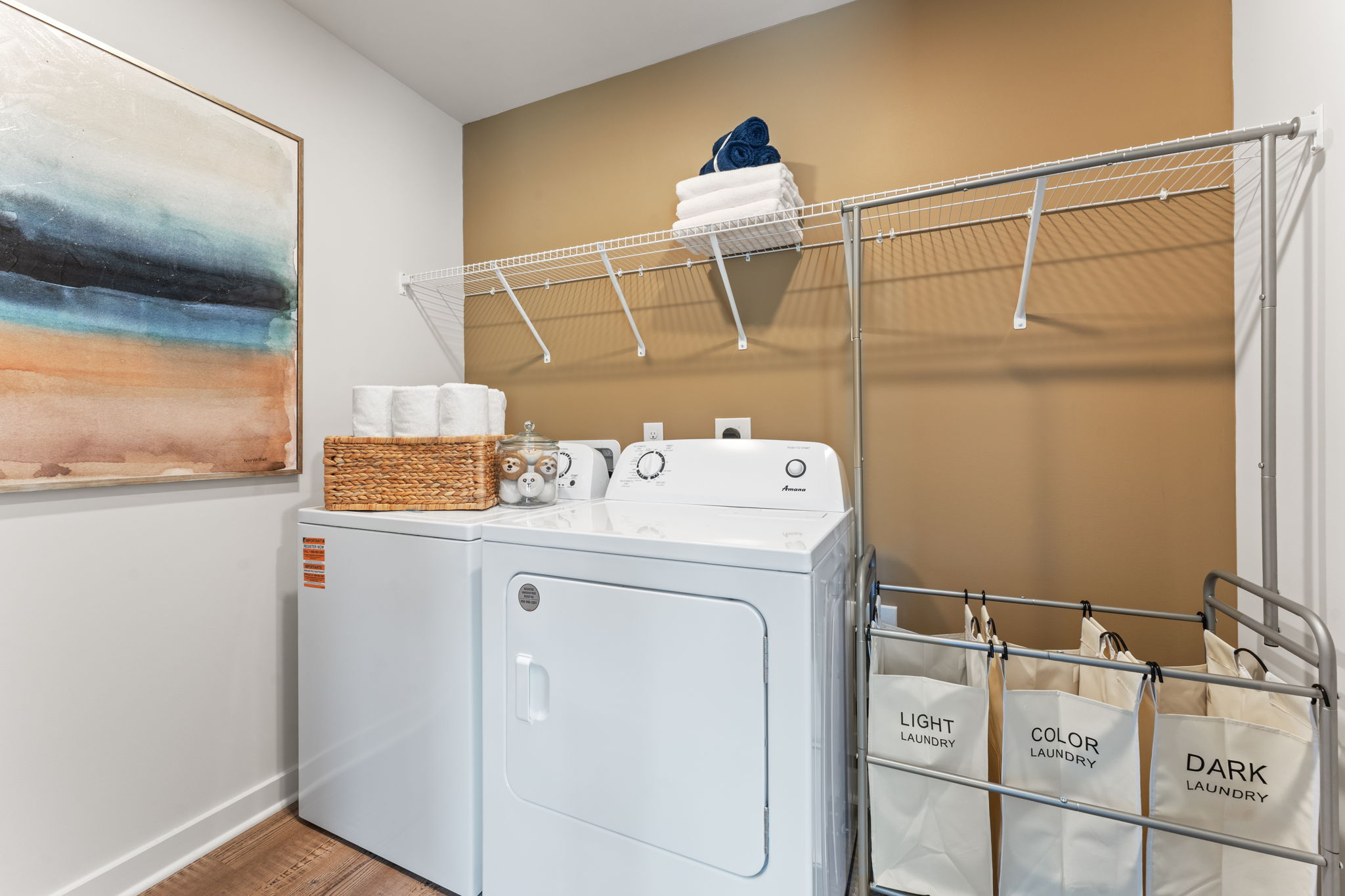 A laundry room with a washer and dryer.