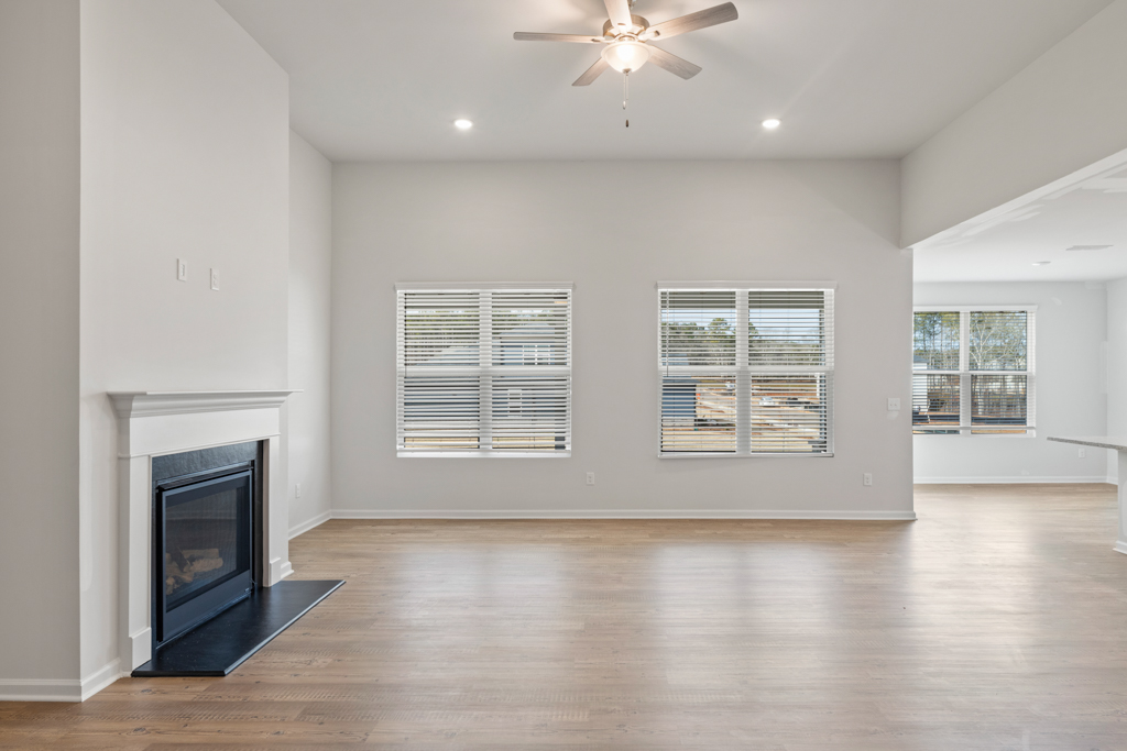 A living room with a fireplace.