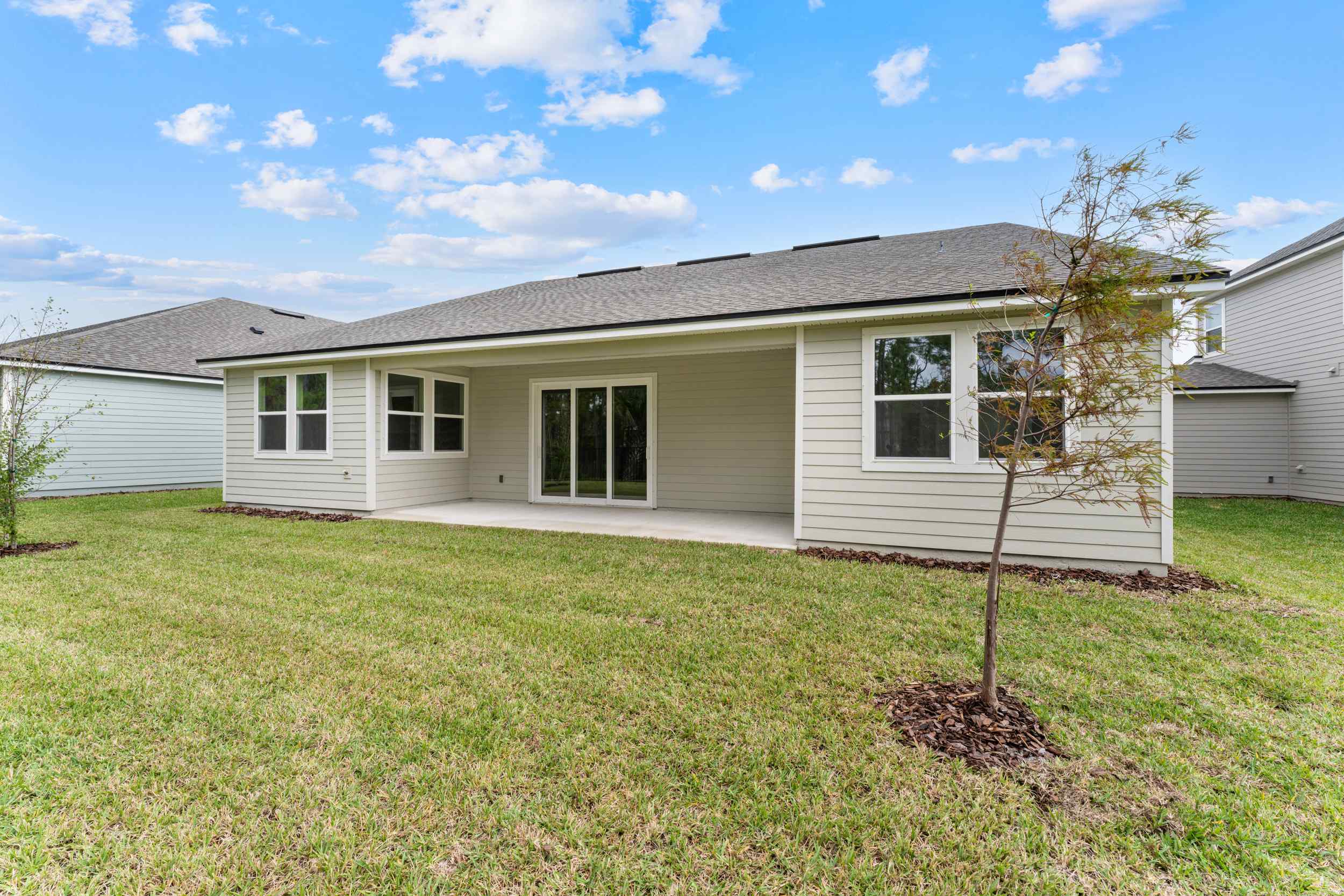 Lot 192 Rear Exterior with Covered Patio at Reserve East in Flagler Beach