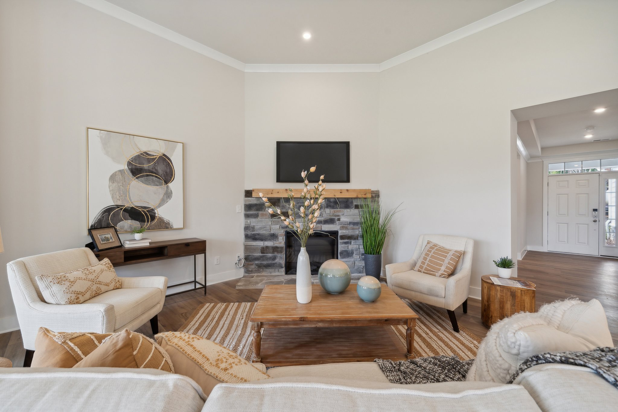 A living room with a fireplace.