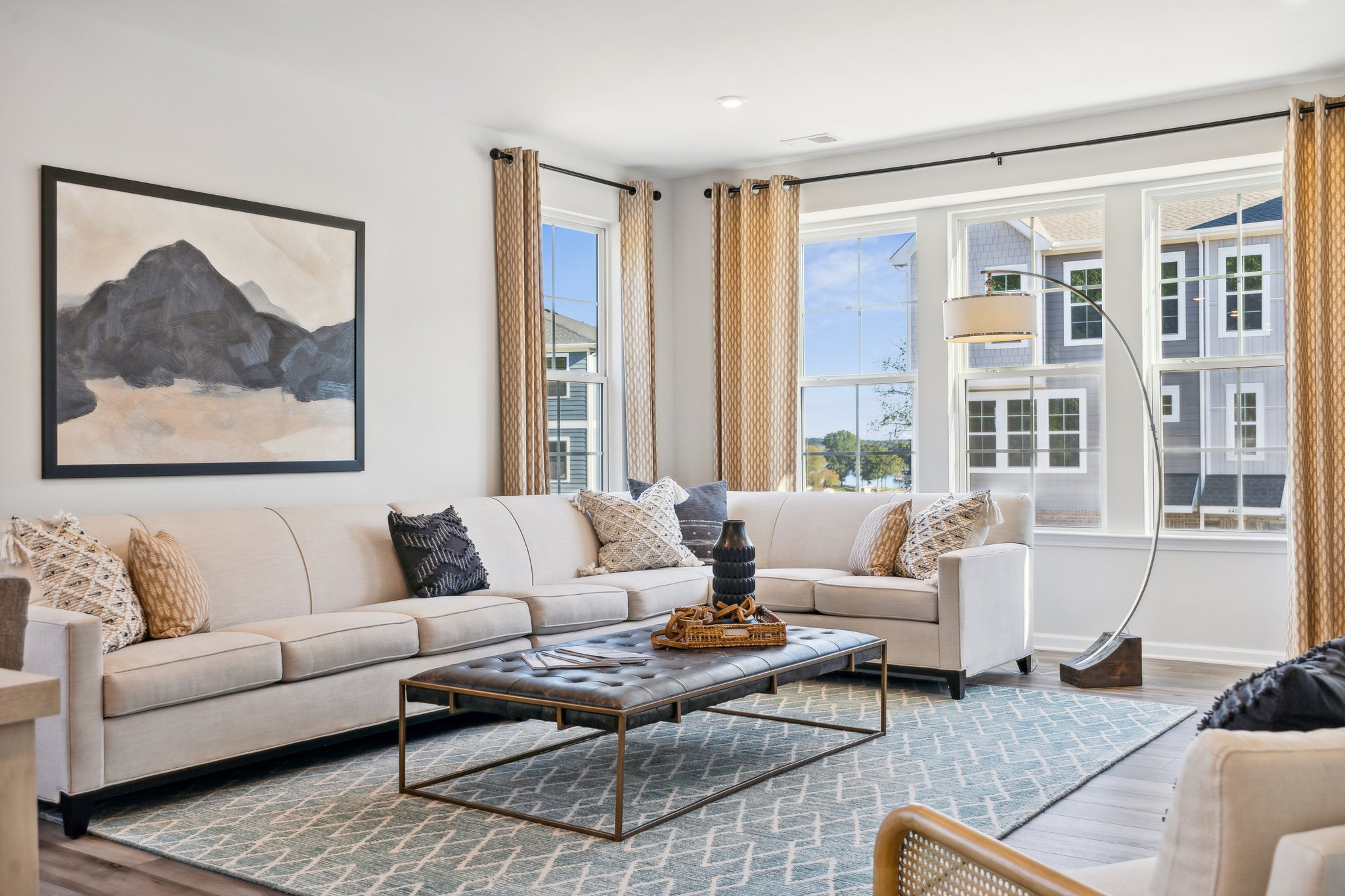 A living room with a large window.
