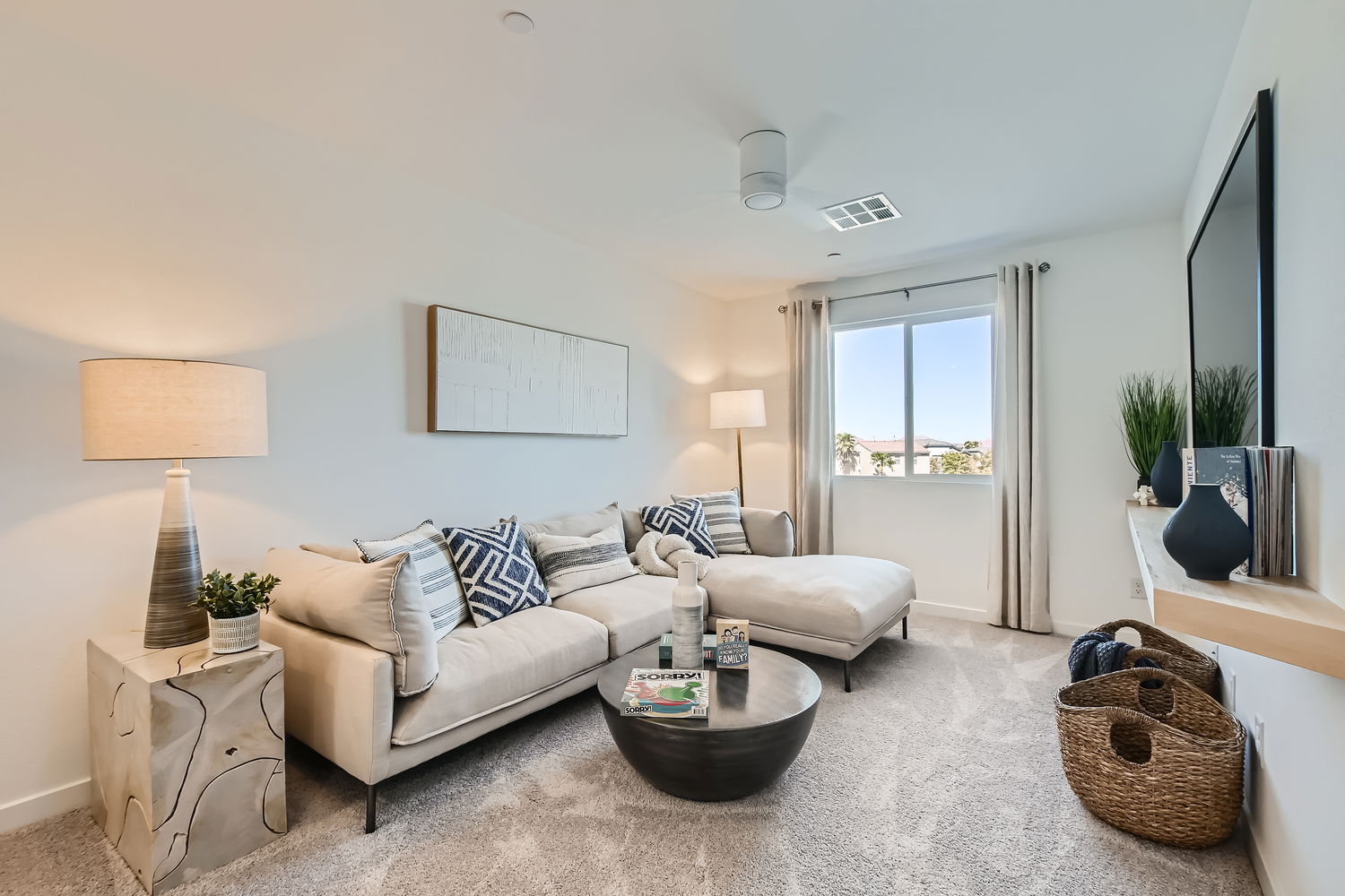 A living room with a couch and a coffee table.