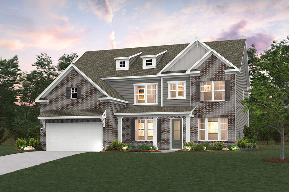 A house with a large front yard.