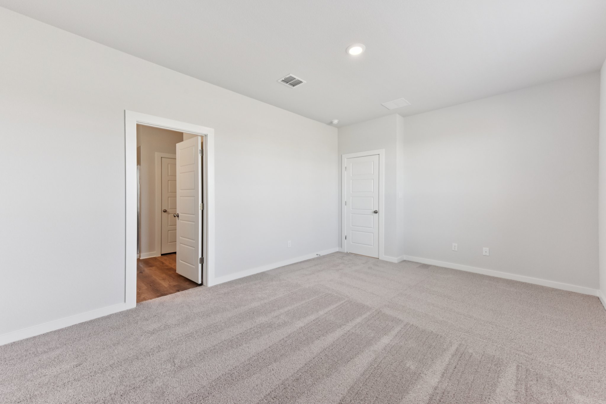 A room with white doors.