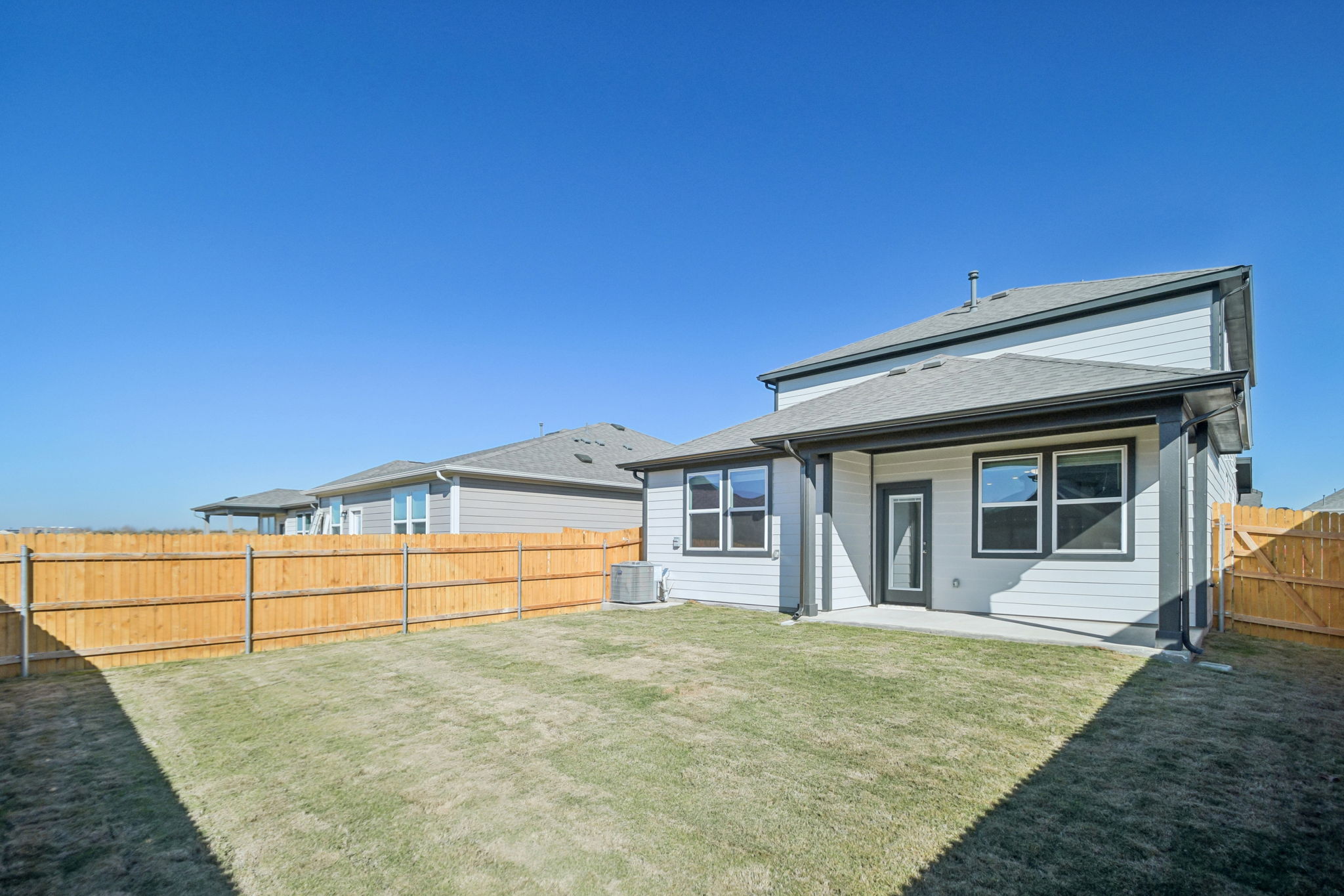 A house with a fence around it.