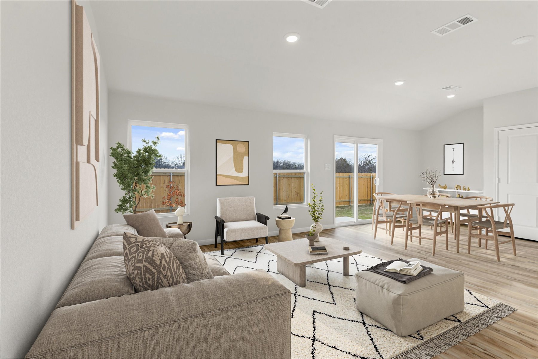 A living room with a couch and a table.