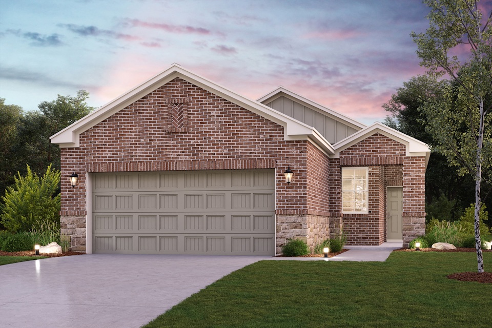 A brick house with a driveway.
