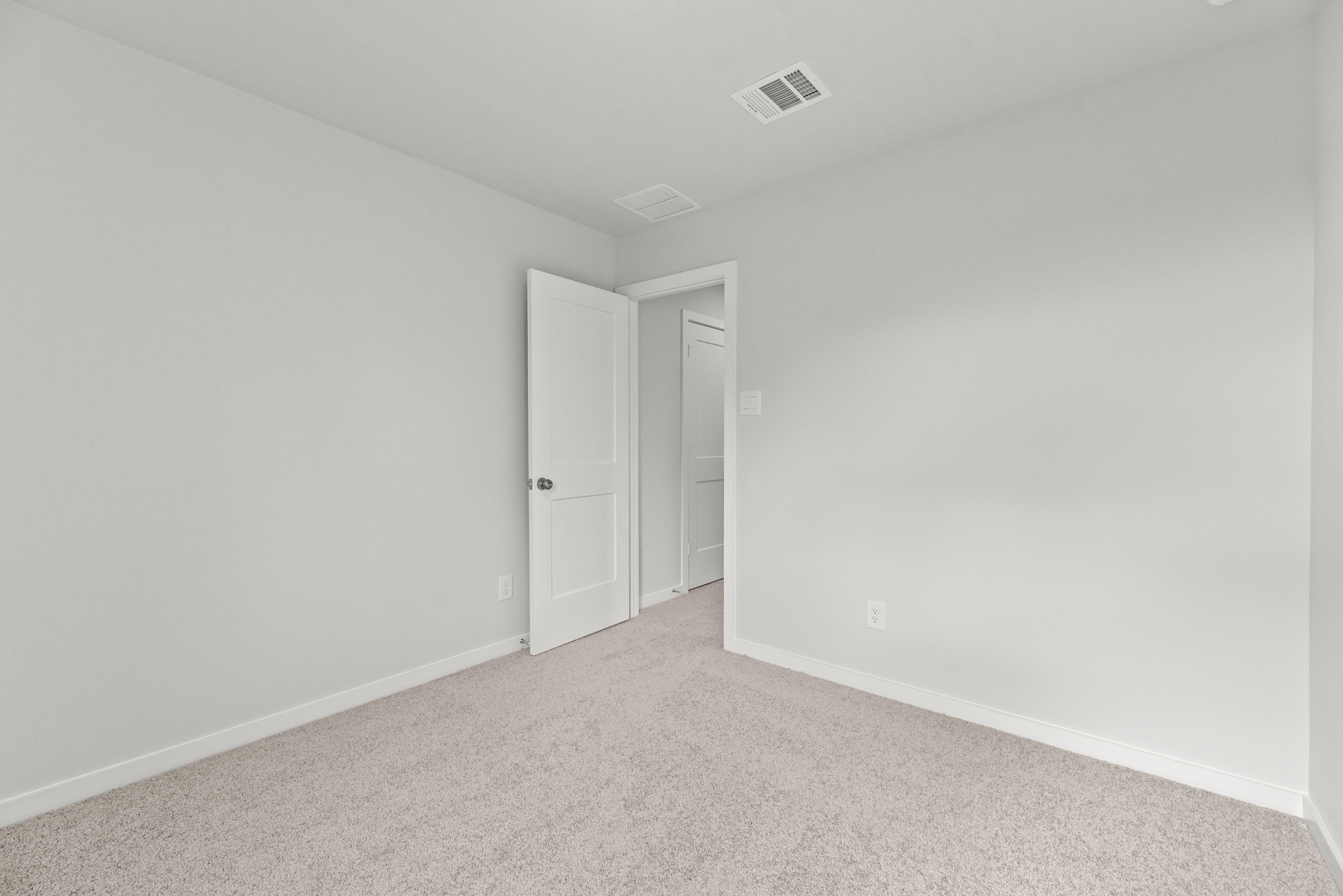 A room with white walls.