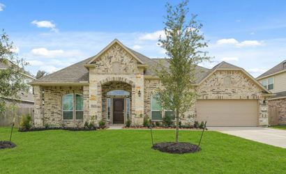 A house with a large front yard.