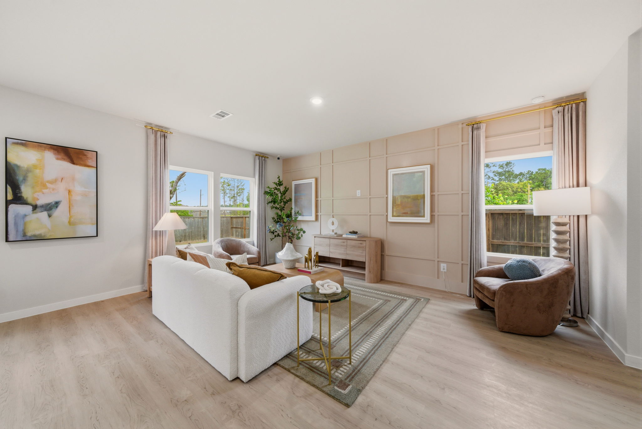 A living room with a large window.