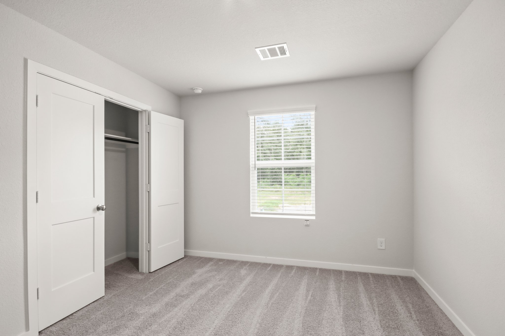 A room with white doors.