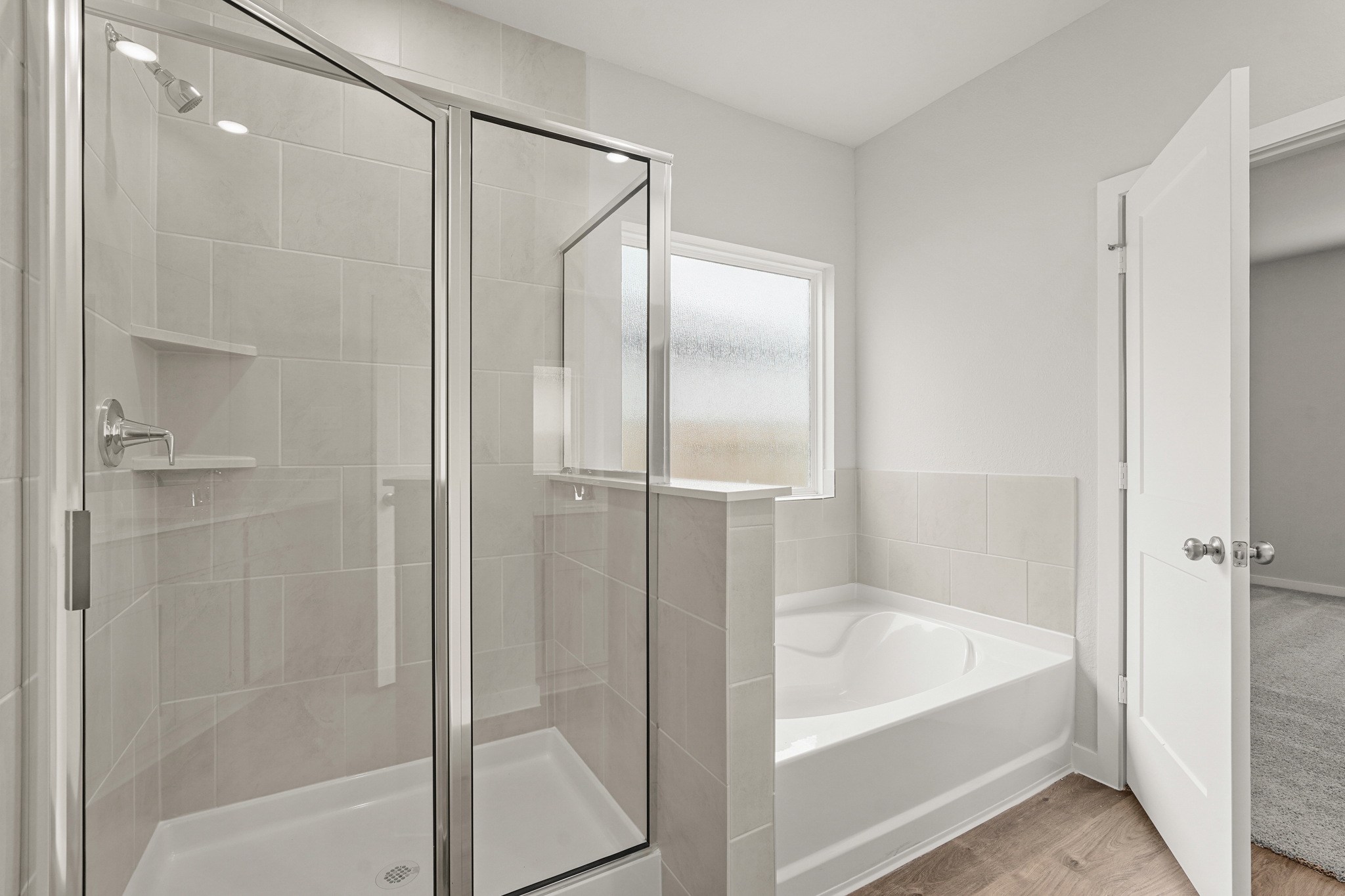 A bathroom with a glass shower.