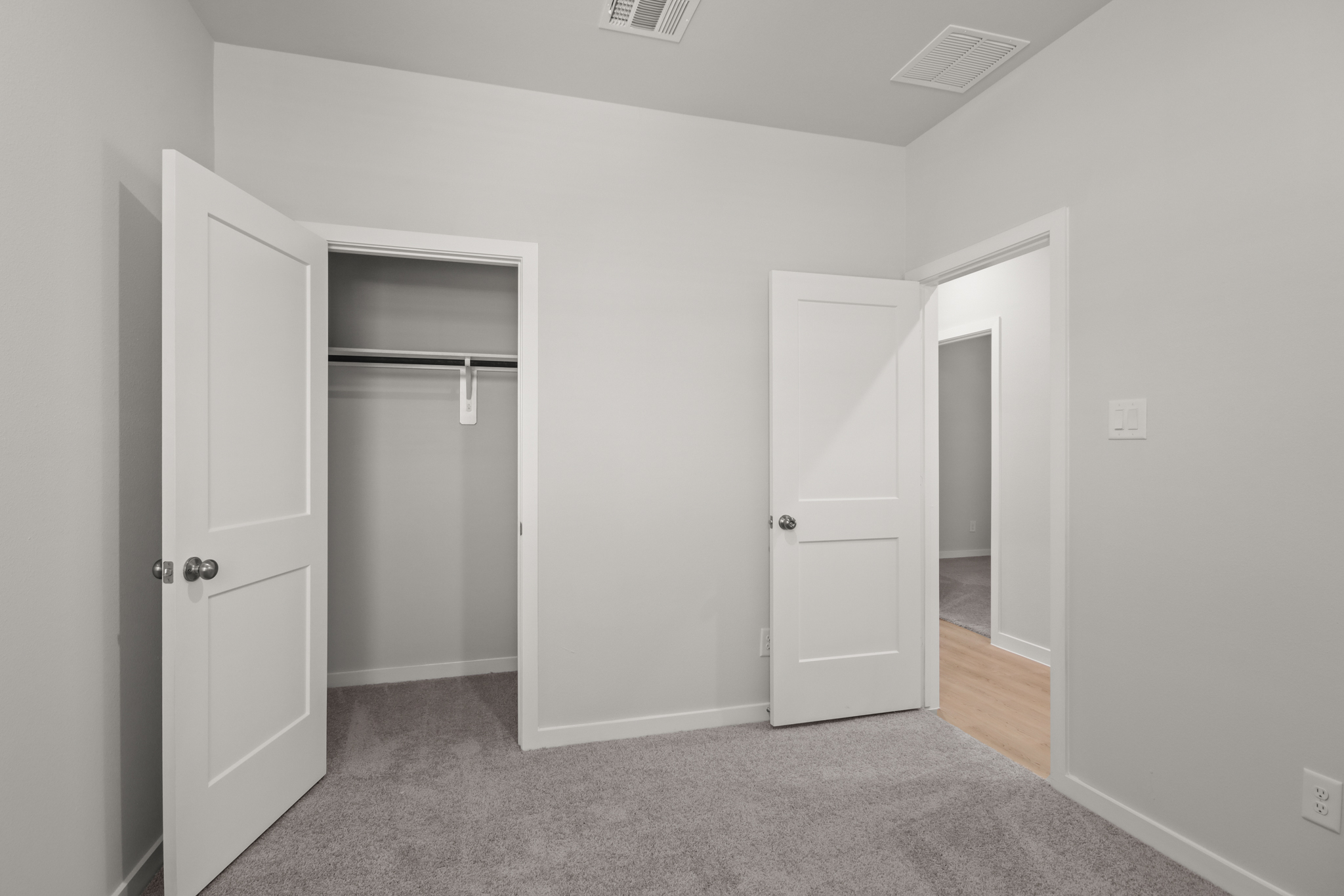 A room with white doors.