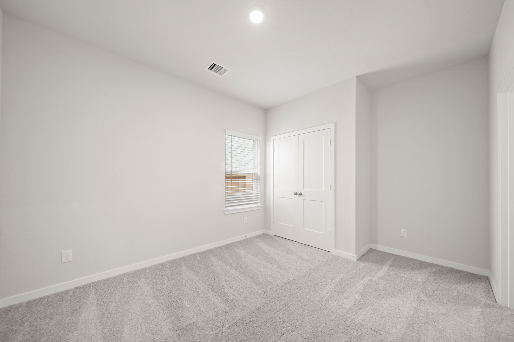 A room with white doors.