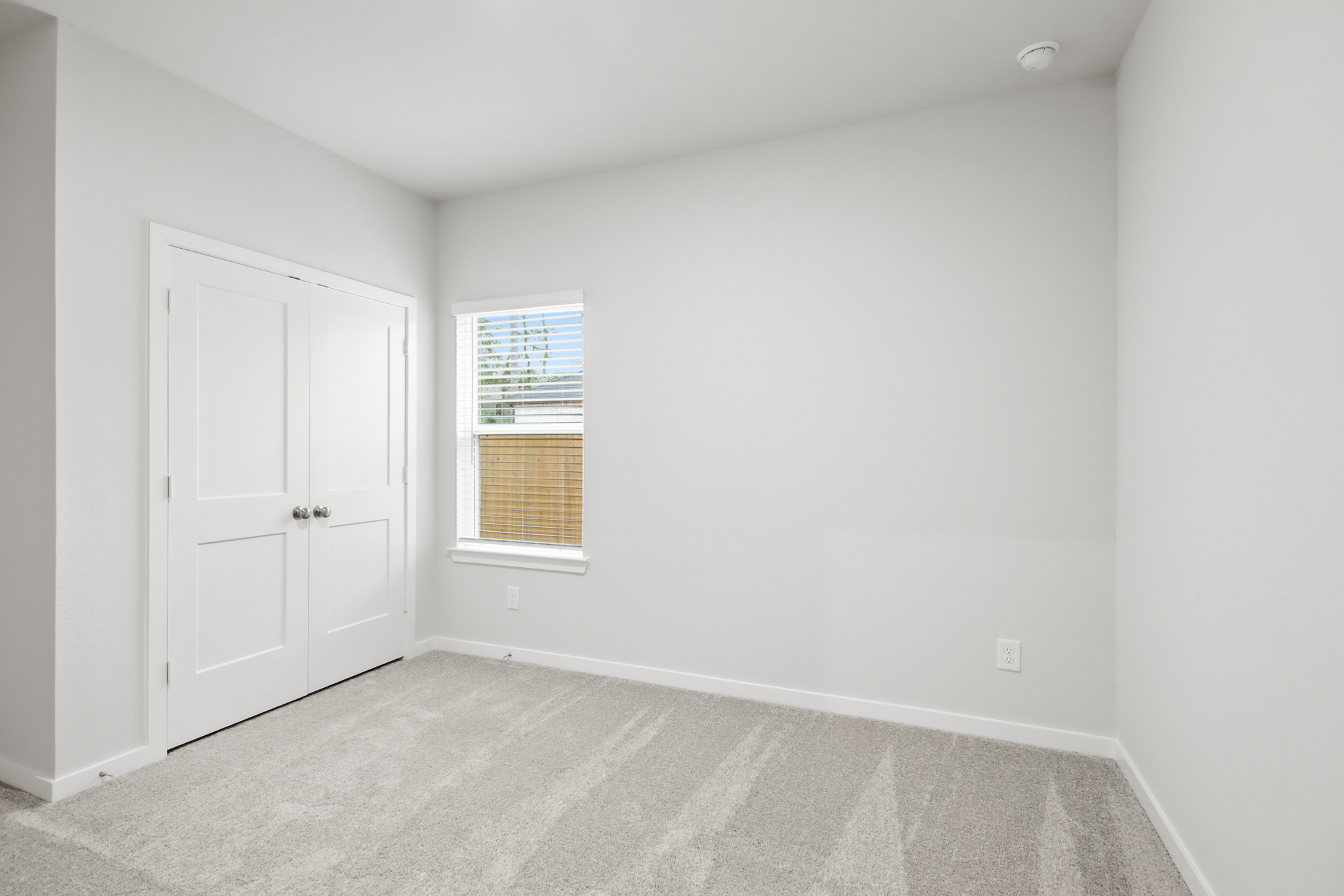 A room with white doors.
