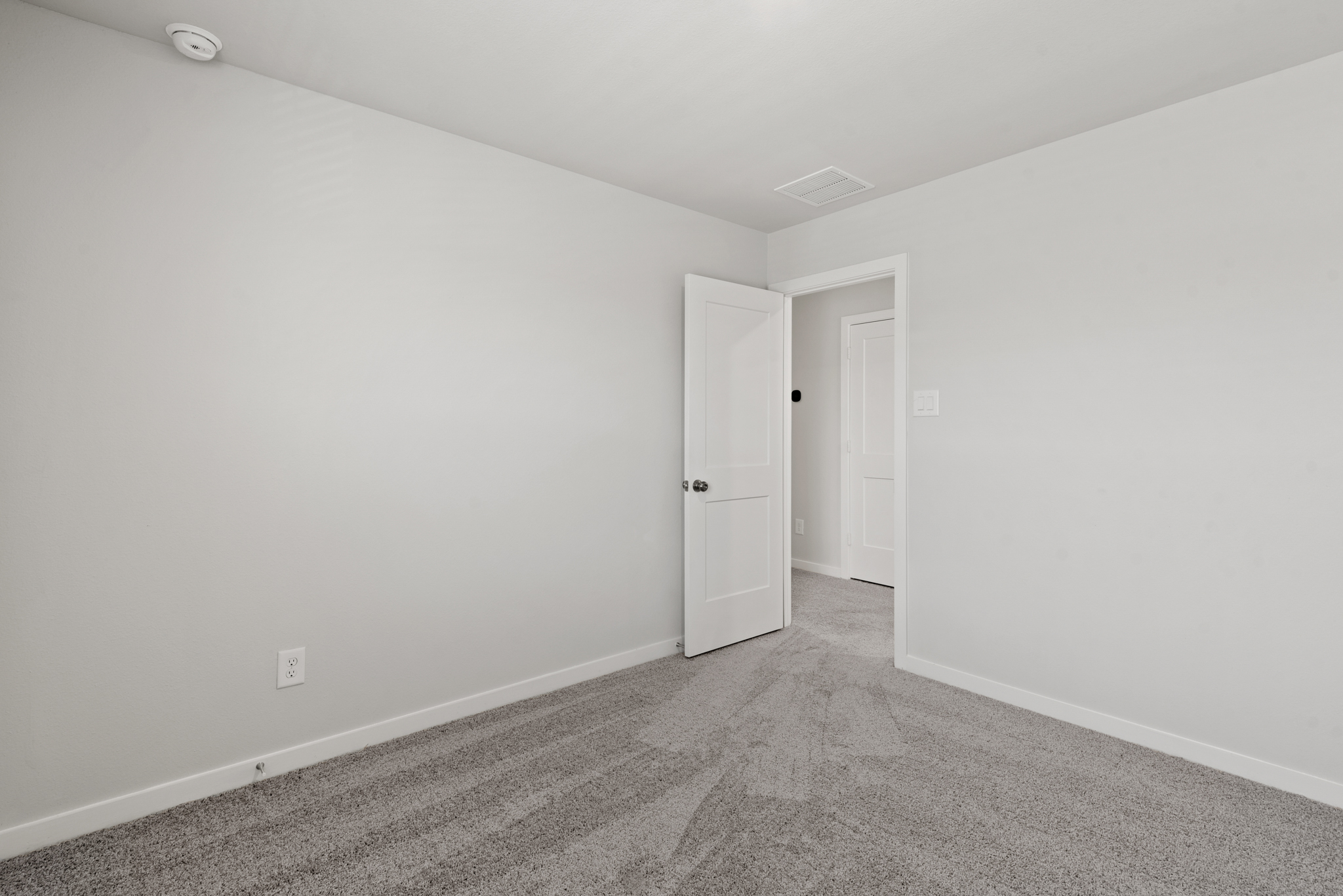 A room with white doors.