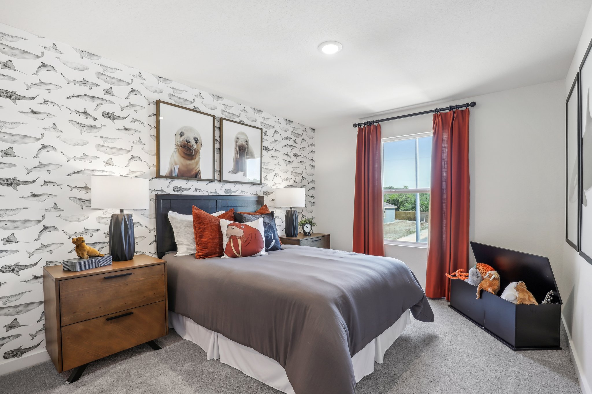 A bedroom with a bed and a couch.