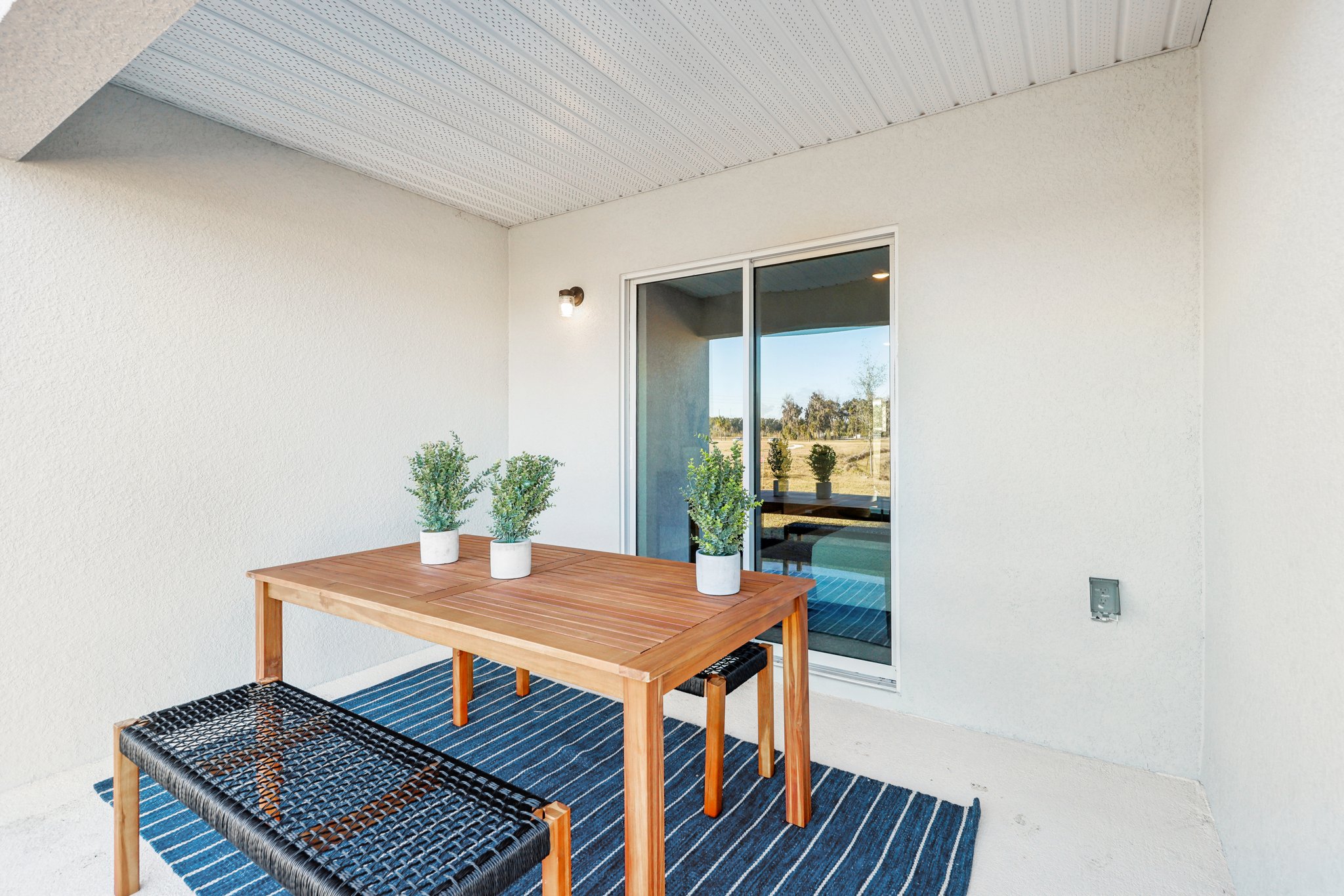 A table and chairs in a room.