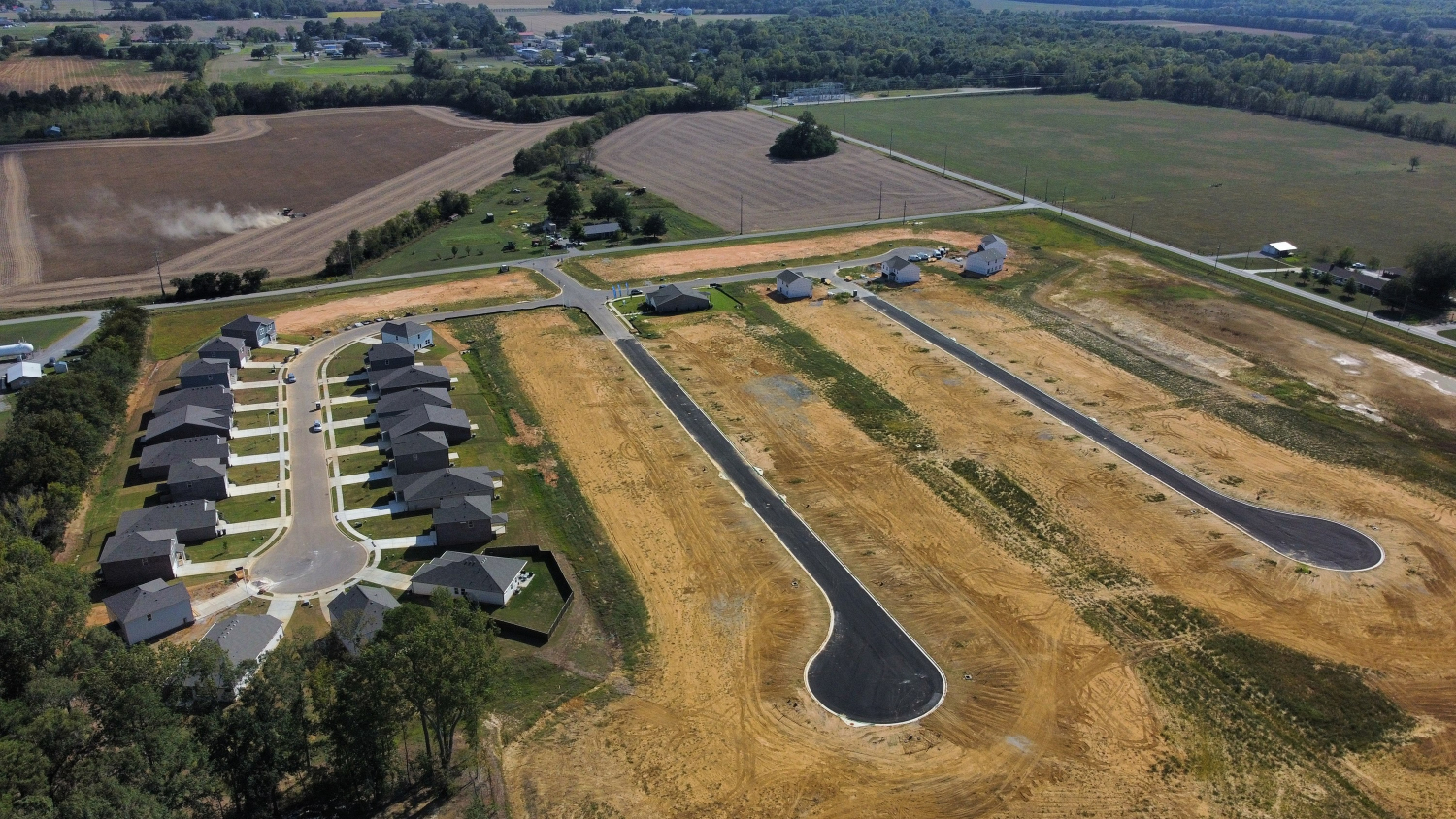 A farm with many rows of crops.