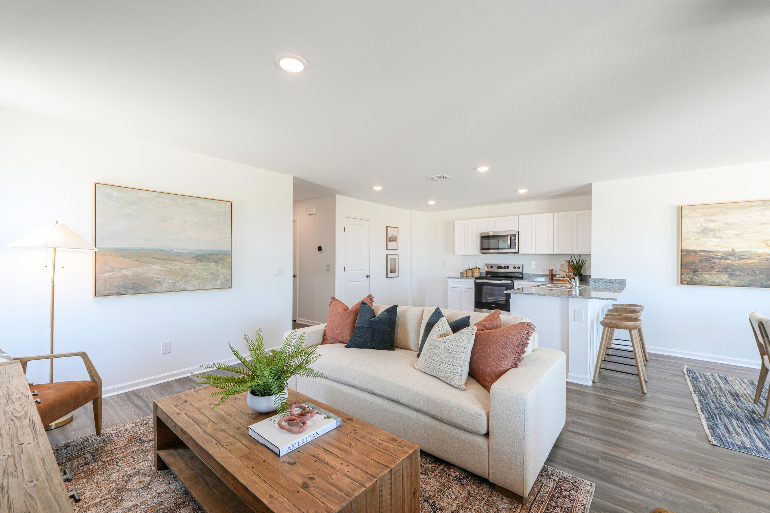A living room with a couch and a coffee table.