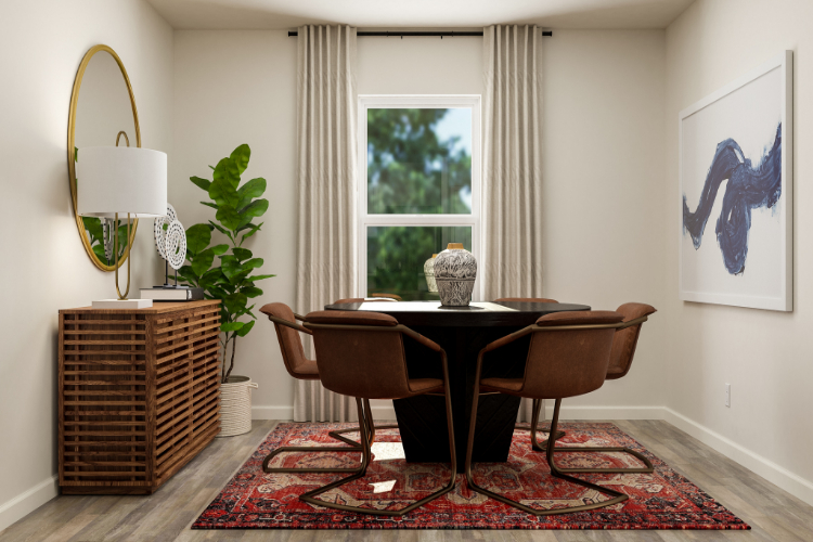 A room with a table and chairs.