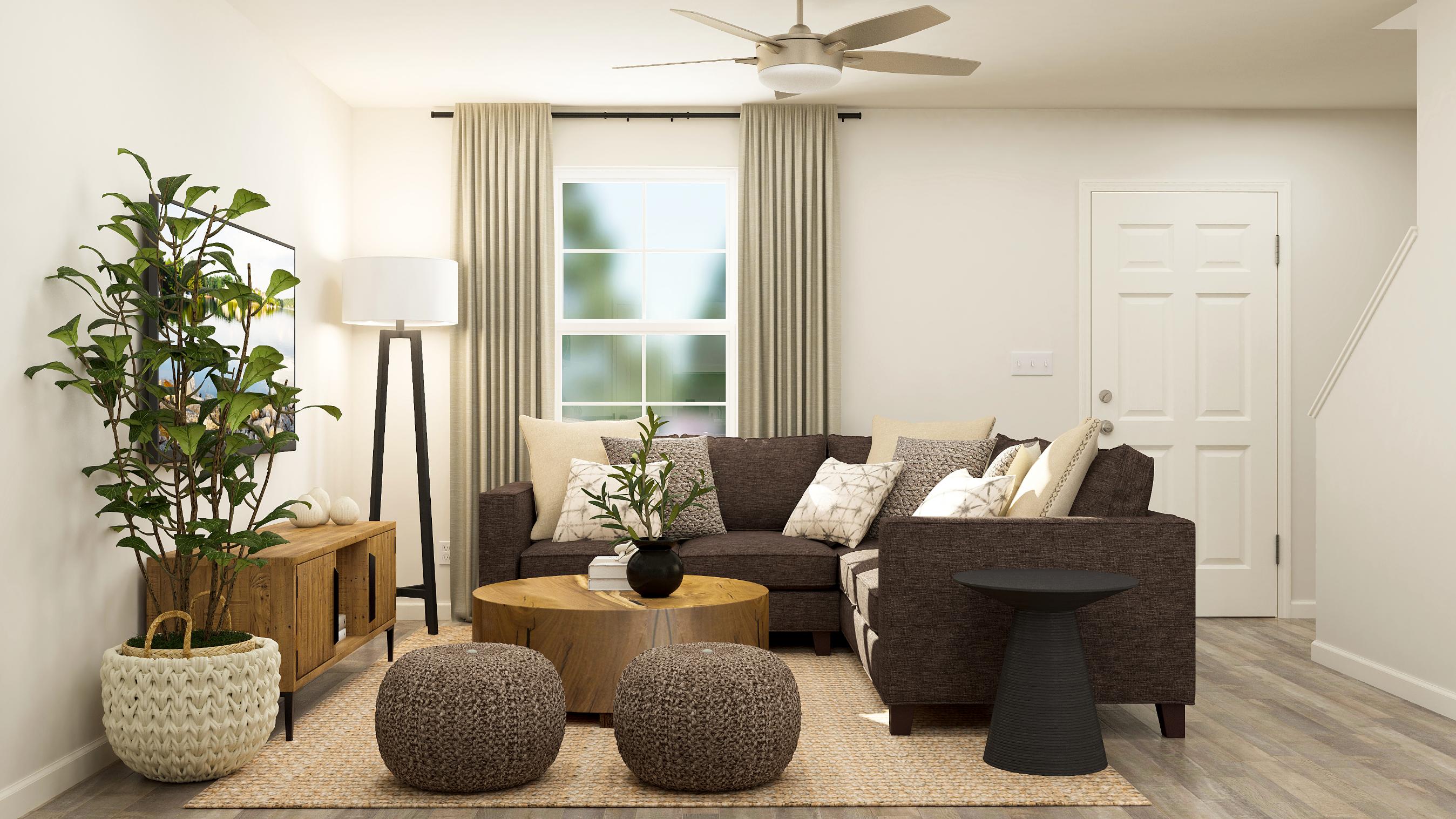 A living room with a couch and a table.