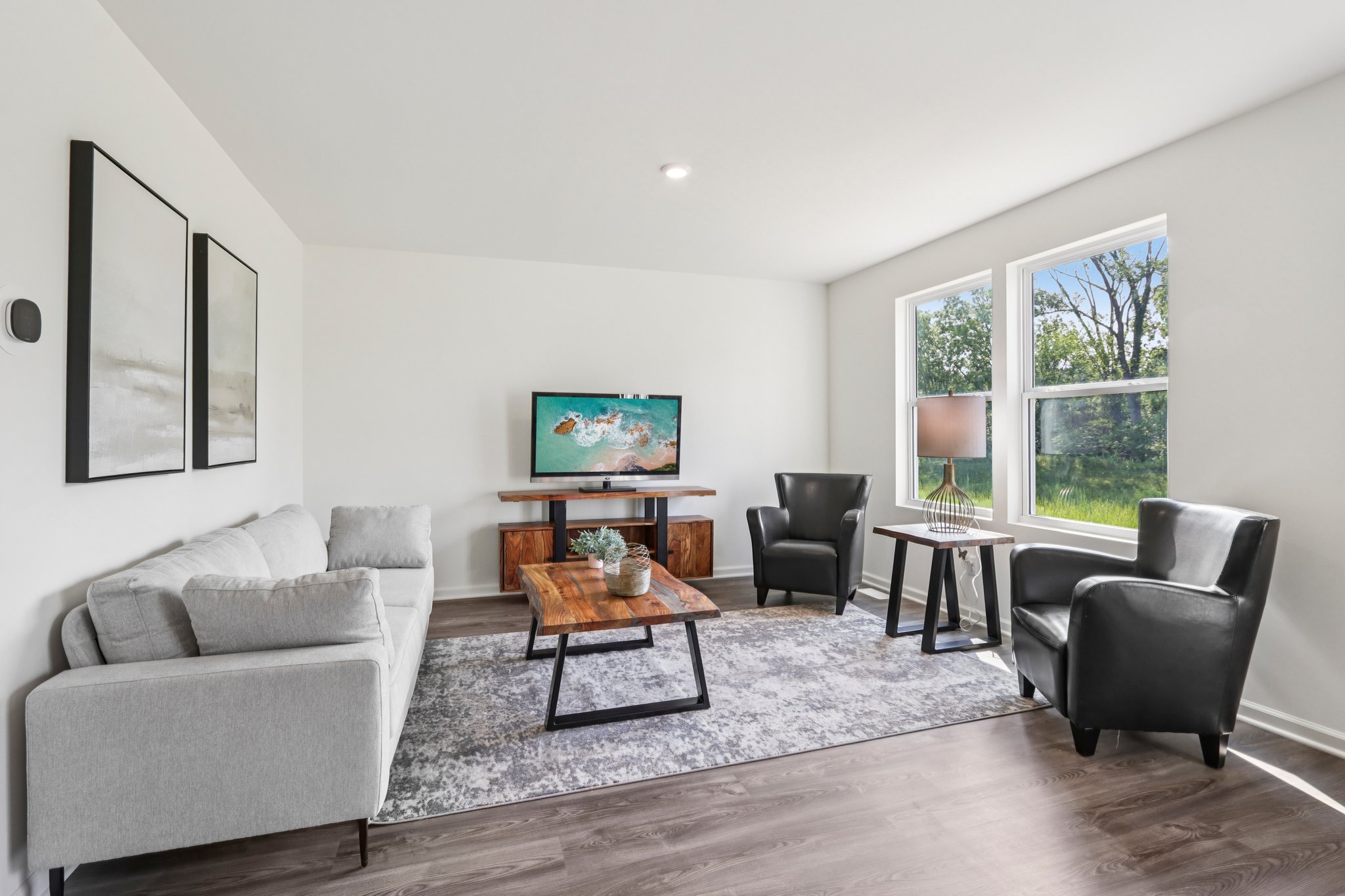 A living room with a couch and a coffee table.