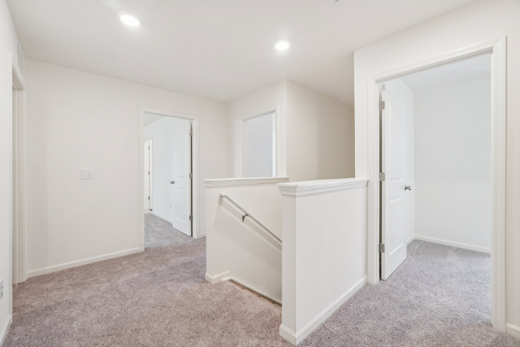 A room with white cabinets.