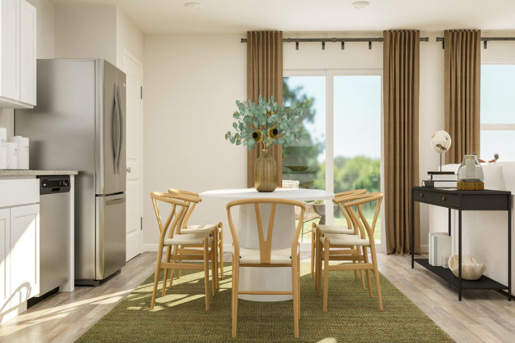 A dining room with a table and chairs.